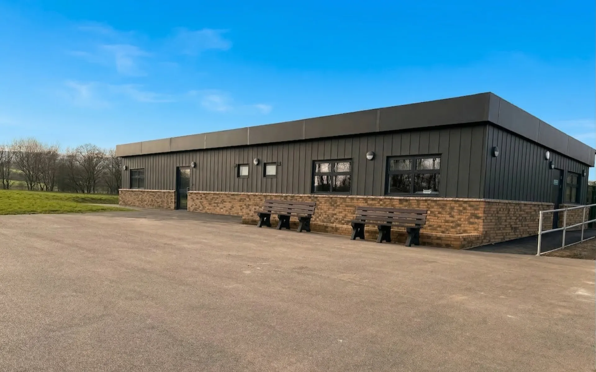 Grey Cladding and Red Brick Modular Classroom Building Block by MPH Building Systems UK