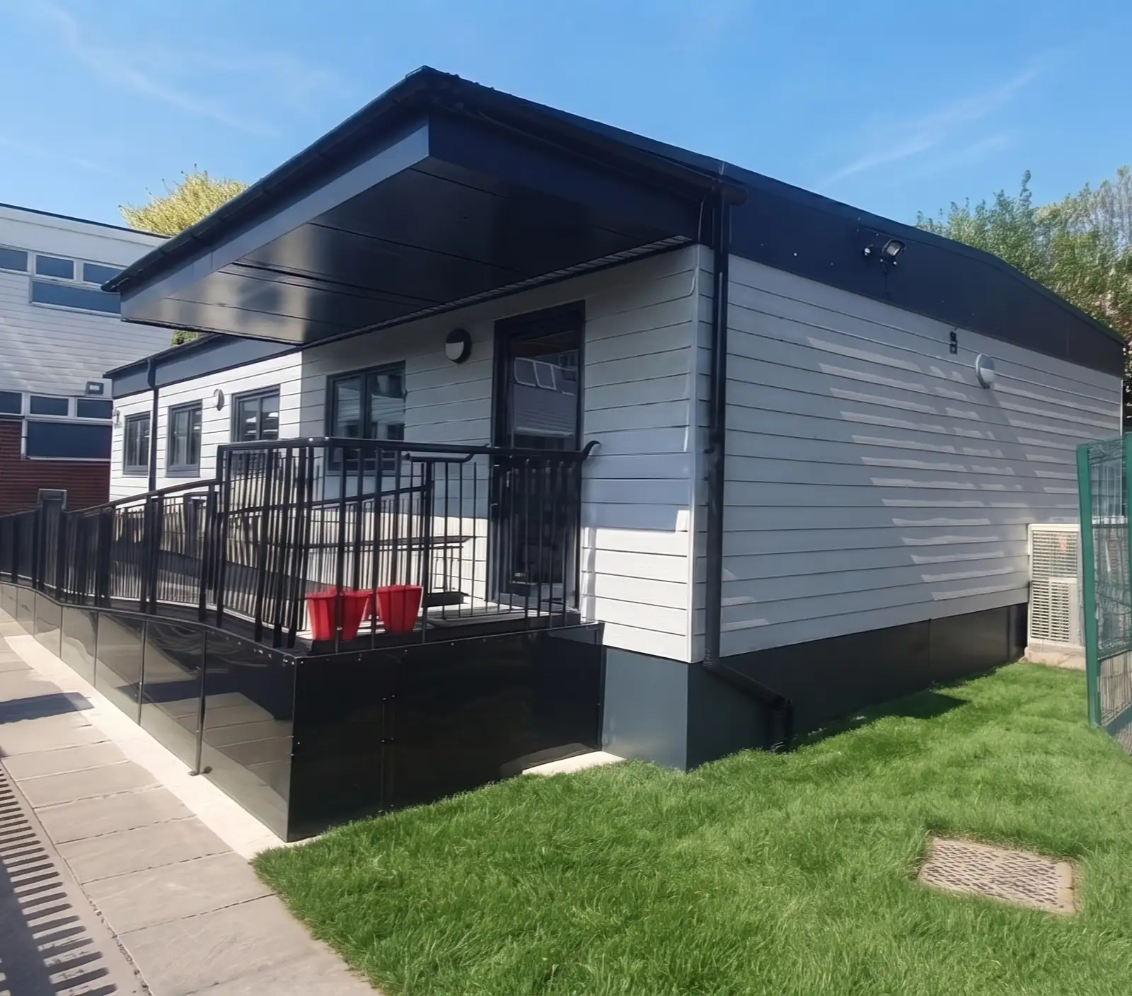Modular Building with Ramp Access Entrance - Black Safety Ramp for Wheelchairs & Mobility Access