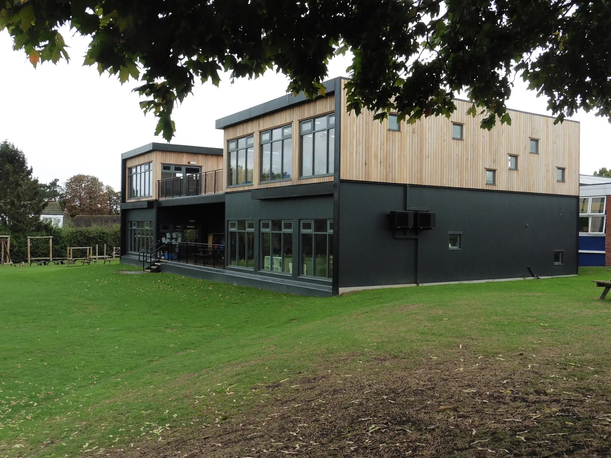 Modular School Extension in Field Showcasing Sustainable Construction