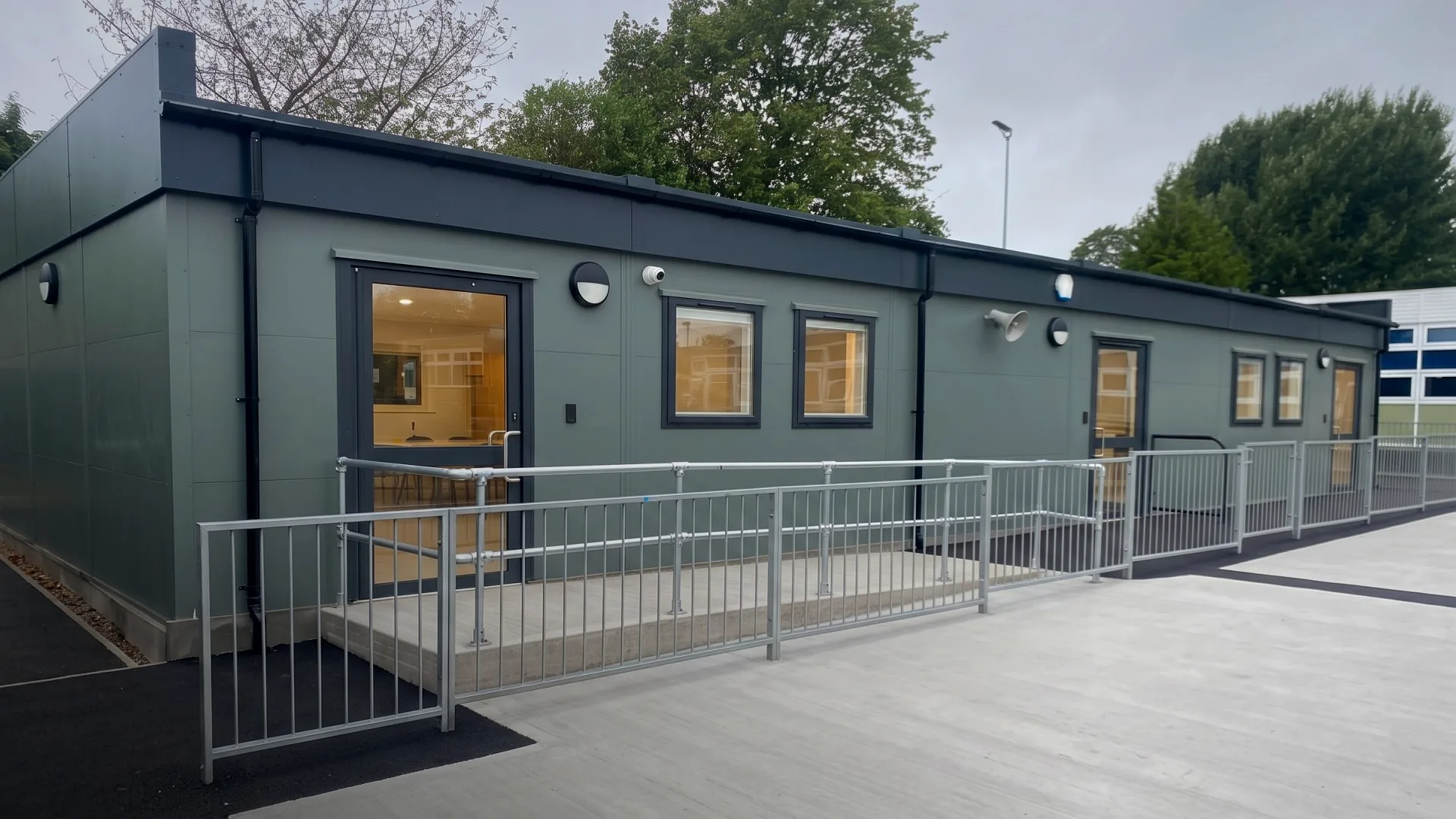 Modular SEND classroom building with accessible ramp entrance at Wilson Stuart School, Birmingham Constructed to BB103 BB104 Guidance for SEND Alternative Provision